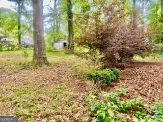 4 bedroom, 2 bathroom, 1,625 sq ft single family residence for sale at 562 Roxbury Drive, Riverdale, GA 30274 — photo 4