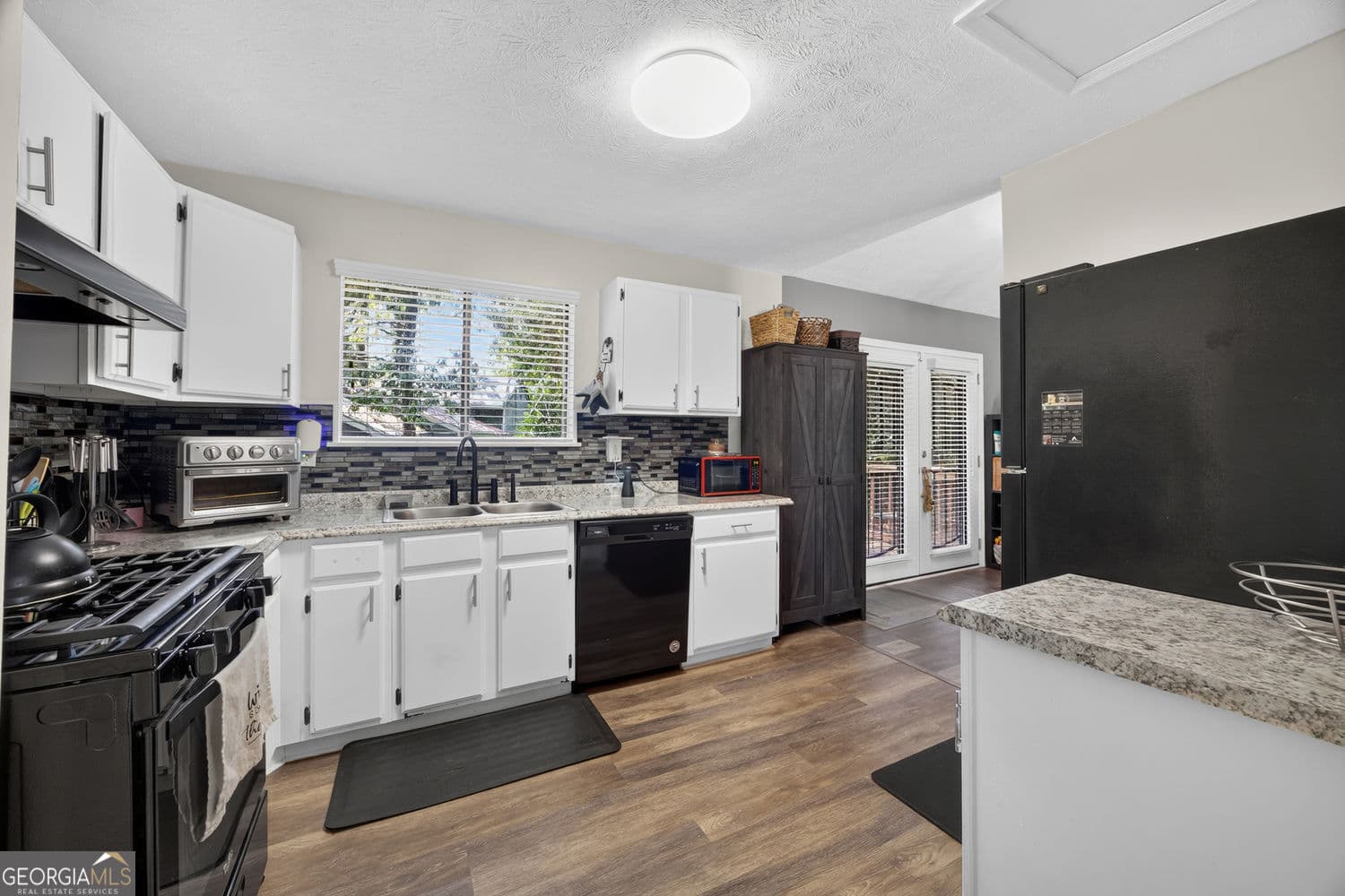 3 bedroom, 2 bathroom, 2,295 sq ft single family residence for sale at 9256 Raven Drive, Jonesboro, GA 30238 — photo 10
