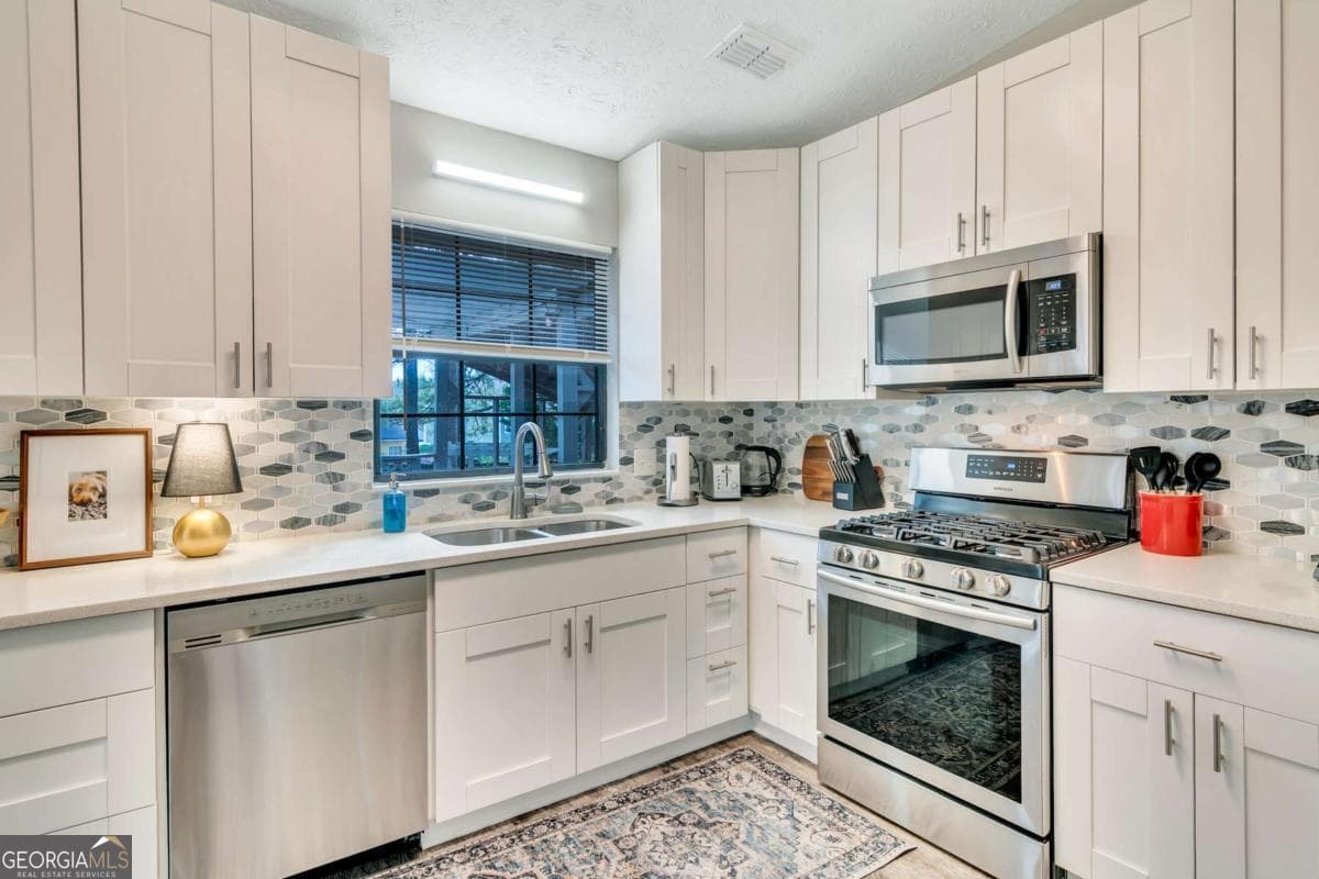 4 bedroom, 3 bathroom single family residence for rent at 3605 Creek Mill Drive, Kennesaw, GA 30152 for $4,950 a month — photo 6