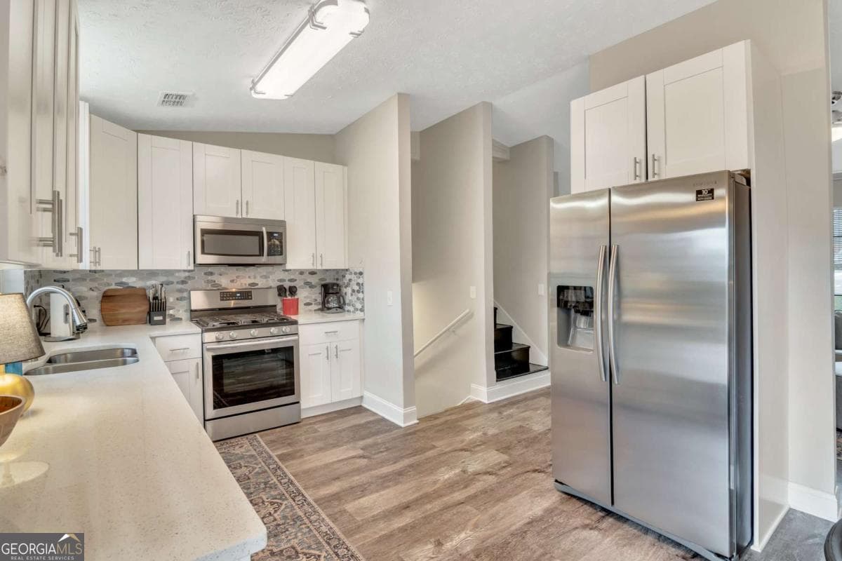 4 bedroom, 3 bathroom single family residence for rent at 3605 Creek Mill Drive, Kennesaw, GA 30152 for $4,950 a month — photo 5