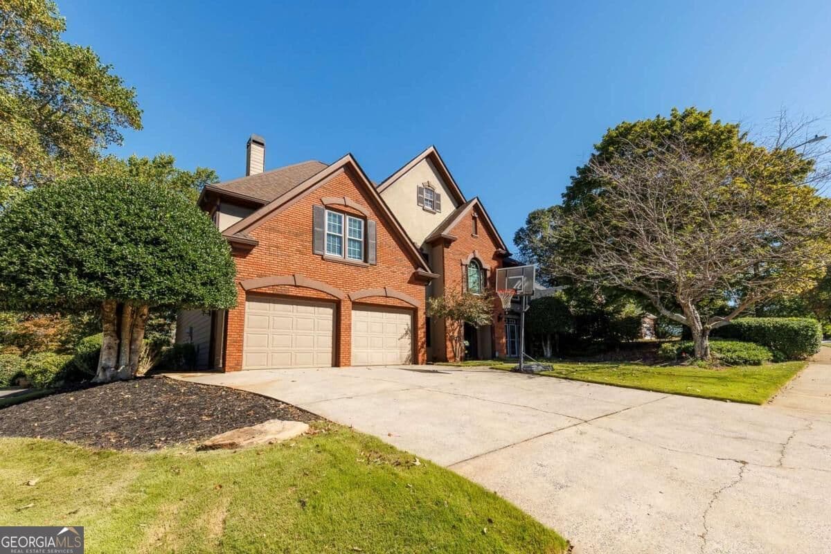 4 bedroom, 2.5 bathroom, 2,824 sq ft single family residence for sale at 7021 Hunters Ridge, Woodstock, GA 30189 — photo 4