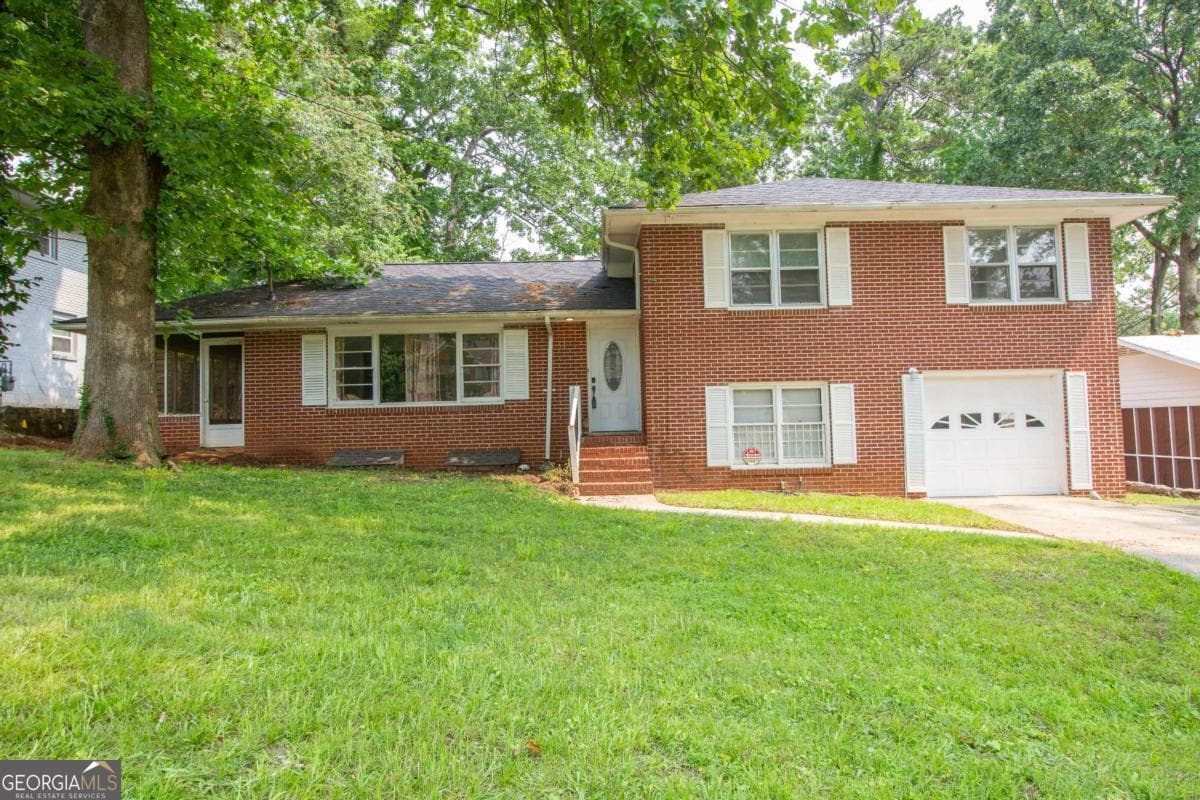 3 bedroom, 2.5 bathroom, 1,780 sq ft single family residence for sale at 1558 BOULDERWOODS Drive, Atlanta, GA 30316 — photo 1 of 46