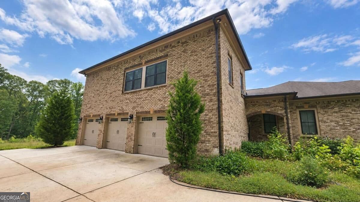 8 bedroom, 9.5 bathroom, 10,000 sq ft single family residence for sale at 1380 Elva Drive, Atlanta, GA 30331 — photo 2