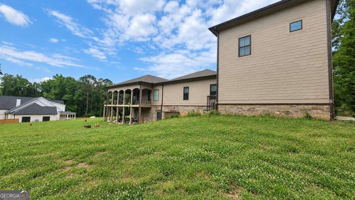 8 bedroom, 9.5 bathroom, 10,000 sq ft single family residence for sale at 1380 Elva Drive, Atlanta, GA 30331 — photo 3