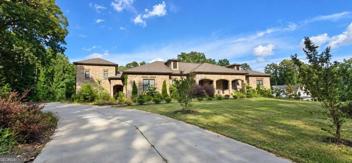 8 bedroom, 9.5 bathroom, 10,000 sq ft single family residence for sale at 1380 Elva Drive, Atlanta, GA 30331 — photo 1 of 3