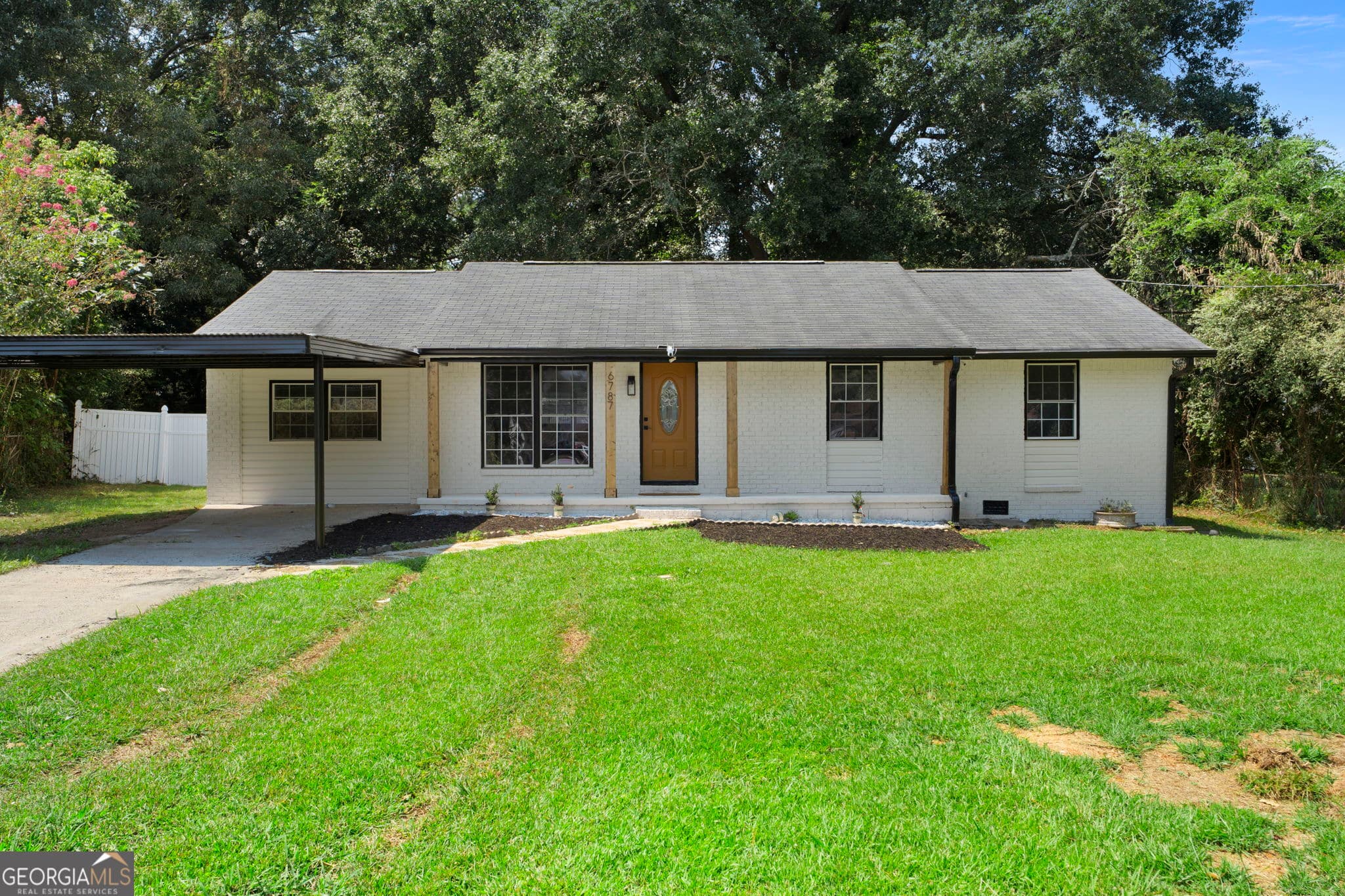 4 bedroom, 2 bathroom, 1,512 sq ft single family residence for sale at 6787 Dnae Court, Riverdale, GA 30274 — photo 2