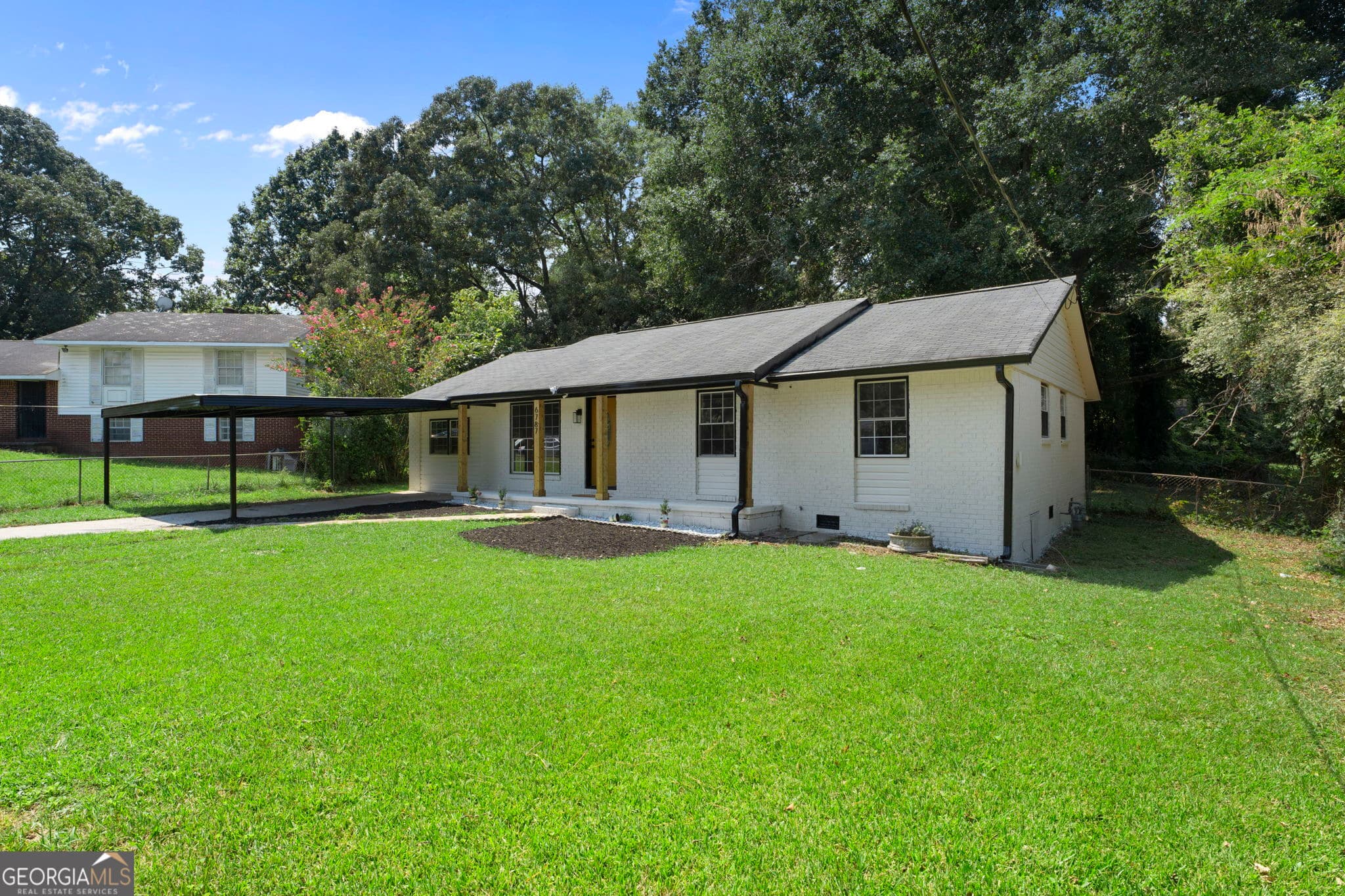 4 bedroom, 2 bathroom, 1,512 sq ft single family residence for sale at 6787 Dnae Court, Riverdale, GA 30274 — photo 4