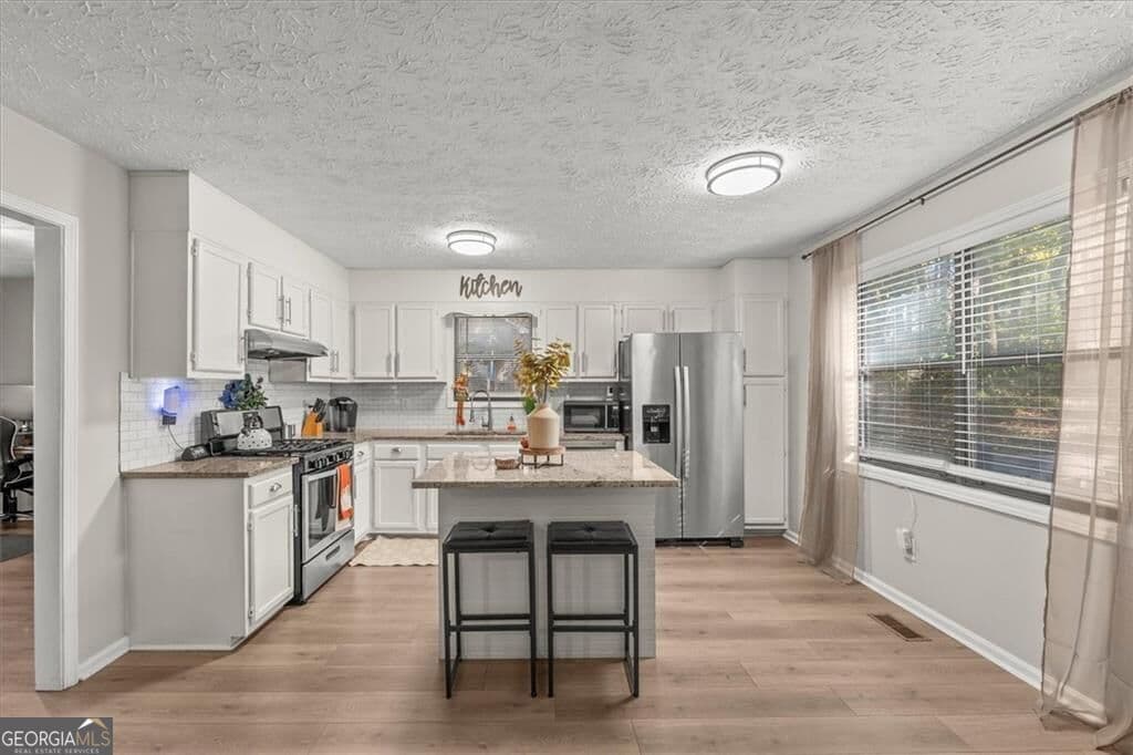 3 bedroom, 2 bathroom, 1,404 sq ft single family residence for sale at 4041 Woodbridge Court, Powder Springs, GA 30127 — photo 9