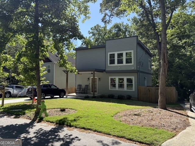 4 bedroom, 2.5 bathroom single family residence for sale at 1040 Ada Avenue, Atlanta, GA 30318 — photo 1 of 43