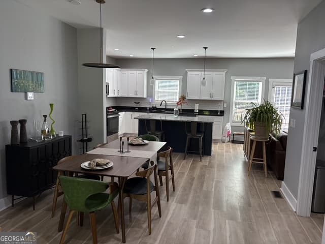4 bedroom, 2.5 bathroom single family residence for sale at 1040 Ada Avenue, Atlanta, GA 30318 — photo 9