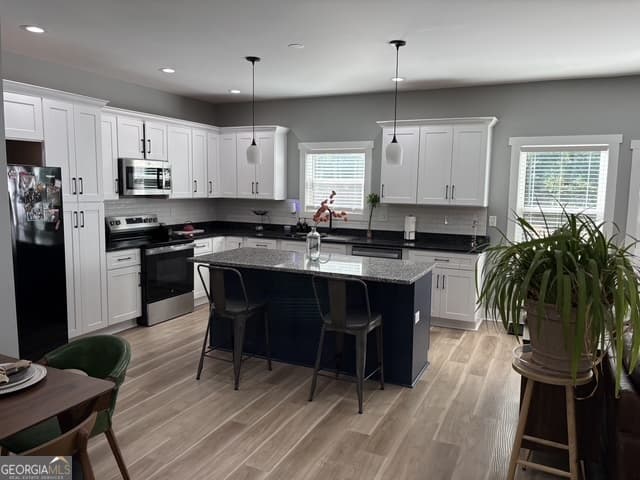 4 bedroom, 2.5 bathroom single family residence for sale at 1040 Ada Avenue, Atlanta, GA 30318 — photo 8