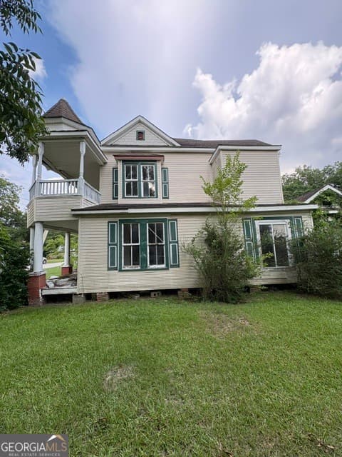 5 bedroom, 3 bathroom, 3,260 sq ft single family residence for sale at 163 First Avenue, Hiltonia, GA 30467 — photo 2