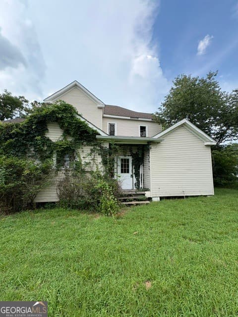 5 bedroom, 3 bathroom, 3,260 sq ft single family residence for sale at 163 First Avenue, Hiltonia, GA 30467 — photo 3
