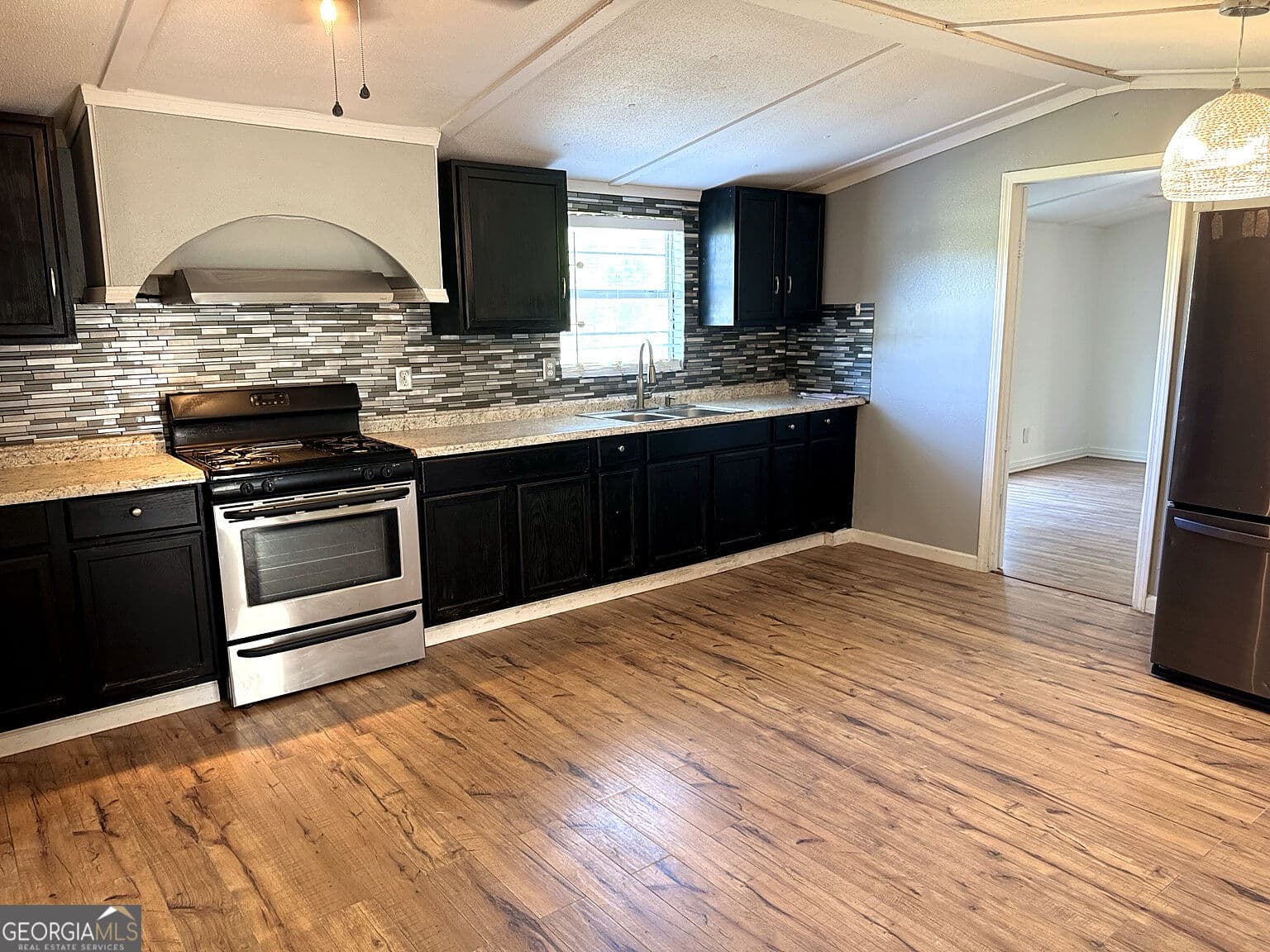 4 bedroom, 2 bathroom, 1,200 sq ft single family residence for sale at 55 Lariat Lane, Reidsville, GA 30453 — photo 2
