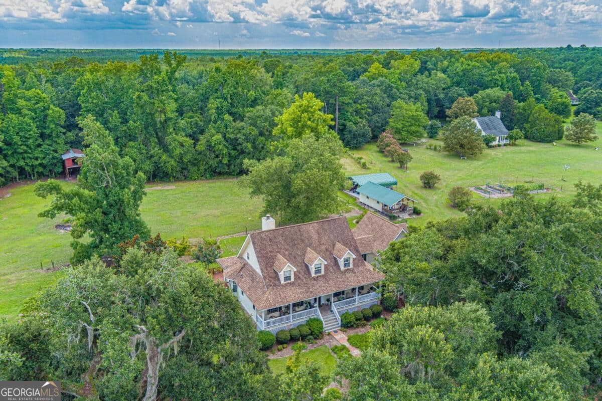 4 bedroom, 3.5 bathroom, 3,403 sq ft single family residence for sale at 1536 Little Mccall Road, Guyton, GA 31312 — photo 4
