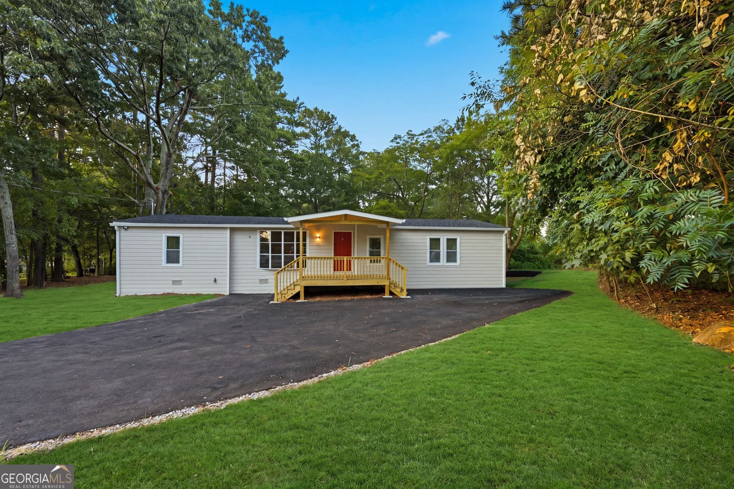 3 bedroom, 2 bathroom, 1,580 sq ft manufactured home,single family residence for sale at 1077 New Hope Road, Lawrenceville, GA 30045 — photo 1 of 40