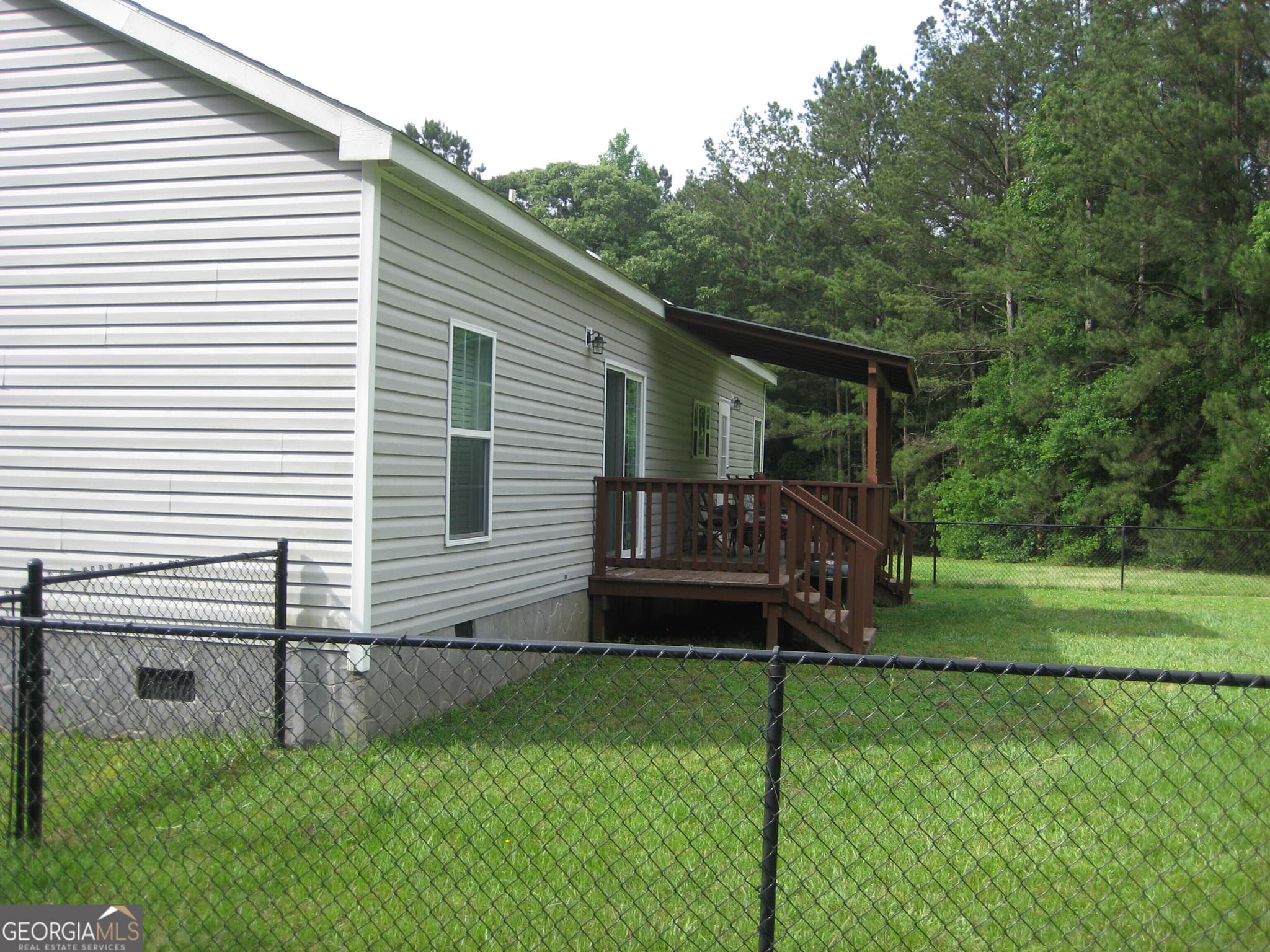3 bedroom, 2 bathroom, 1,556 sq ft manufactured home,single family residence for sale at 1044 Union School Road, Molena, GA 30258 — photo 5