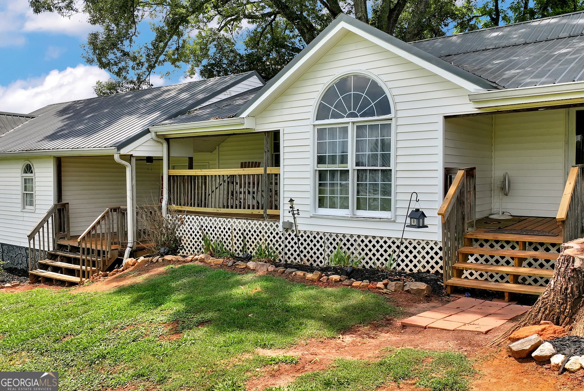3 bedroom, 2 bathroom, 2,625 sq ft single family residence for sale at 6009 Holly Springs Road, Pendergrass, GA 30567 — photo 2