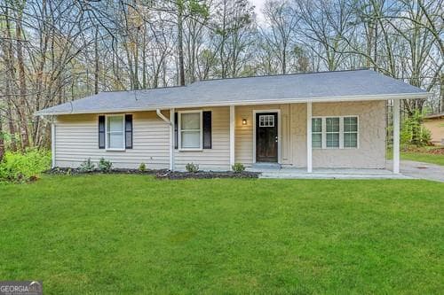 4 bedroom, 1.5 bathroom, 1,406 sq ft single family residence for sale at 4864 Brookstone Parkway, Ellenwood, GA 30294
