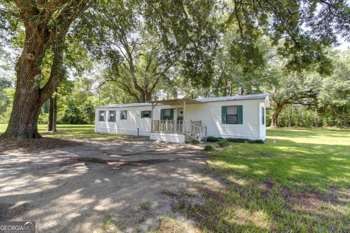 2 bedroom, 2 bathroom manufactured home,single family residence for sale at 3289 LOT B Eldora Road, Ellabell, GA 31308 — photo 3