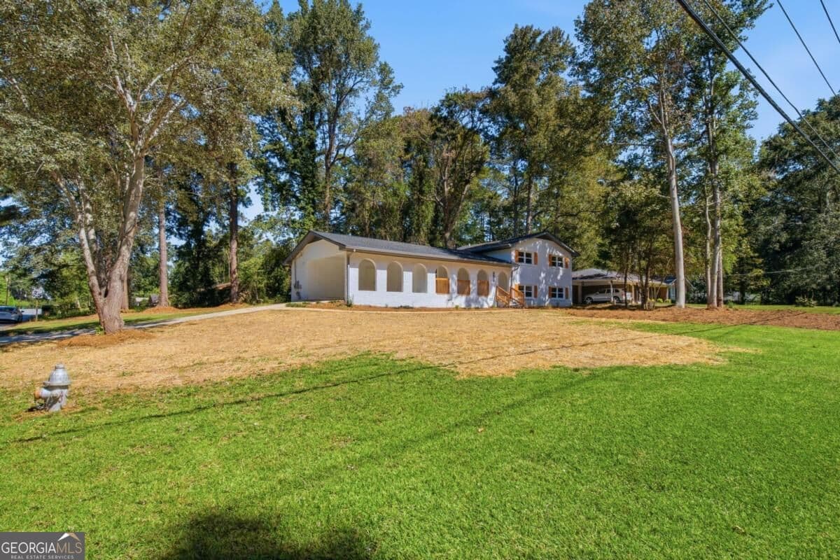 5 bedroom, 3 bathroom, 2,331 sq ft single family residence for sale at 4804 Thompson Mill Road 0, Lithonia, GA 30038 — photo 2