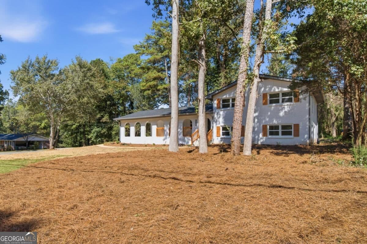 5 bedroom, 3 bathroom, 2,331 sq ft single family residence for sale at 4804 Thompson Mill Road 0, Lithonia, GA 30038 — photo 4