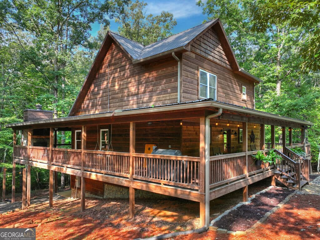 4 bedroom, 3 bathroom, 3,366 sq ft cabin,single family residence for sale at 467 Logan Drive, Mineral Bluff, GA 30559 — photo 3
