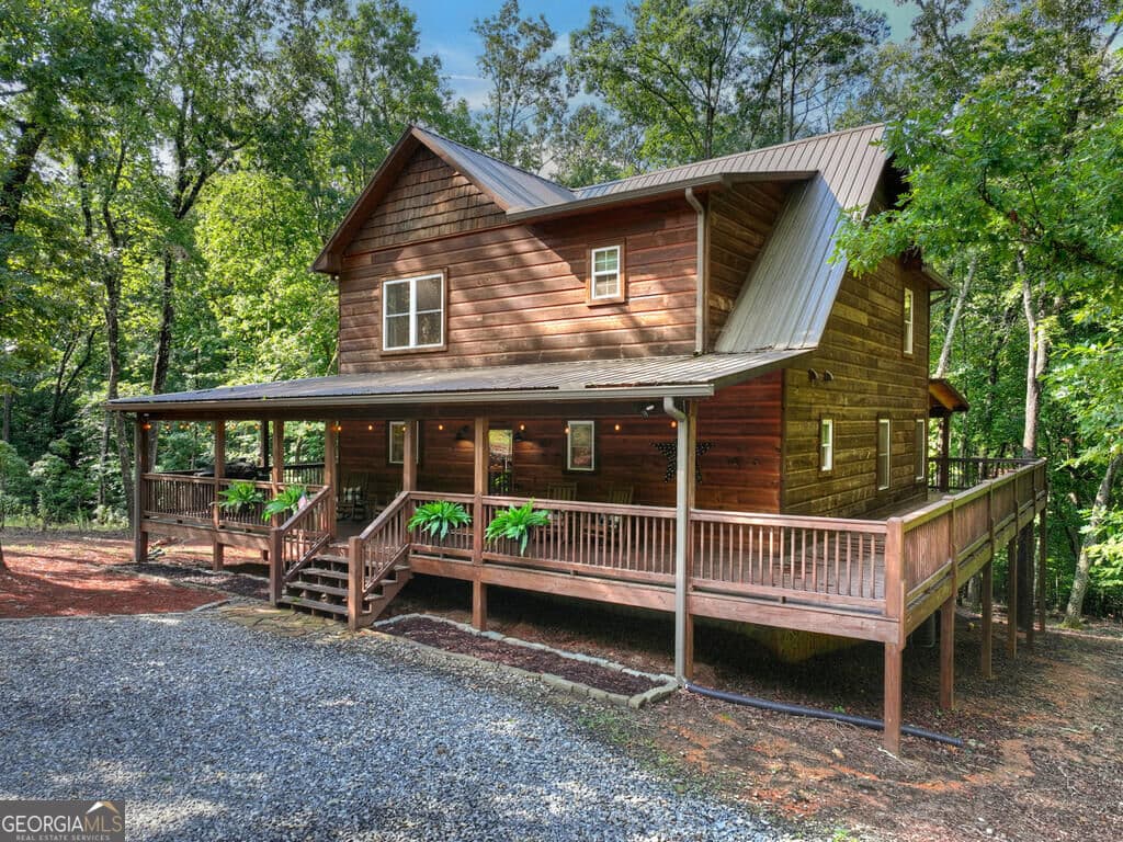 4 bedroom, 3 bathroom, 3,366 sq ft cabin,single family residence for sale at 467 Logan Drive, Mineral Bluff, GA 30559 — photo 1 of 66