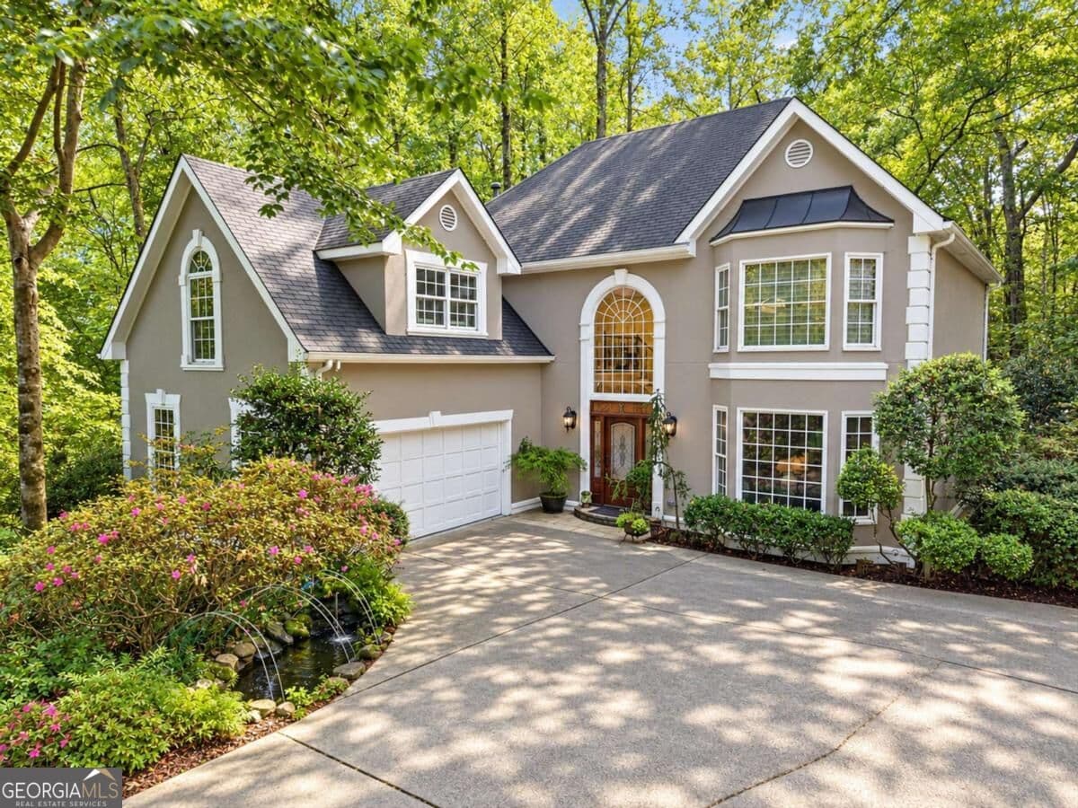 4 bedroom, 3.5 bathroom, 2,844 sq ft single family residence for sale at 5475 Hampstead Way, Johns Creek, GA 30097 — photo 1 of 42