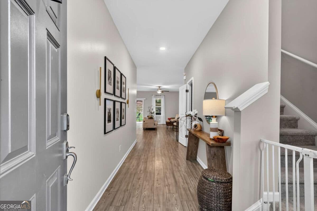 5 bedroom, 2.5 bathroom, 2,275 sq ft single family residence for sale at 4617 Waxwing Street, Hoschton, GA 30548 — photo 6