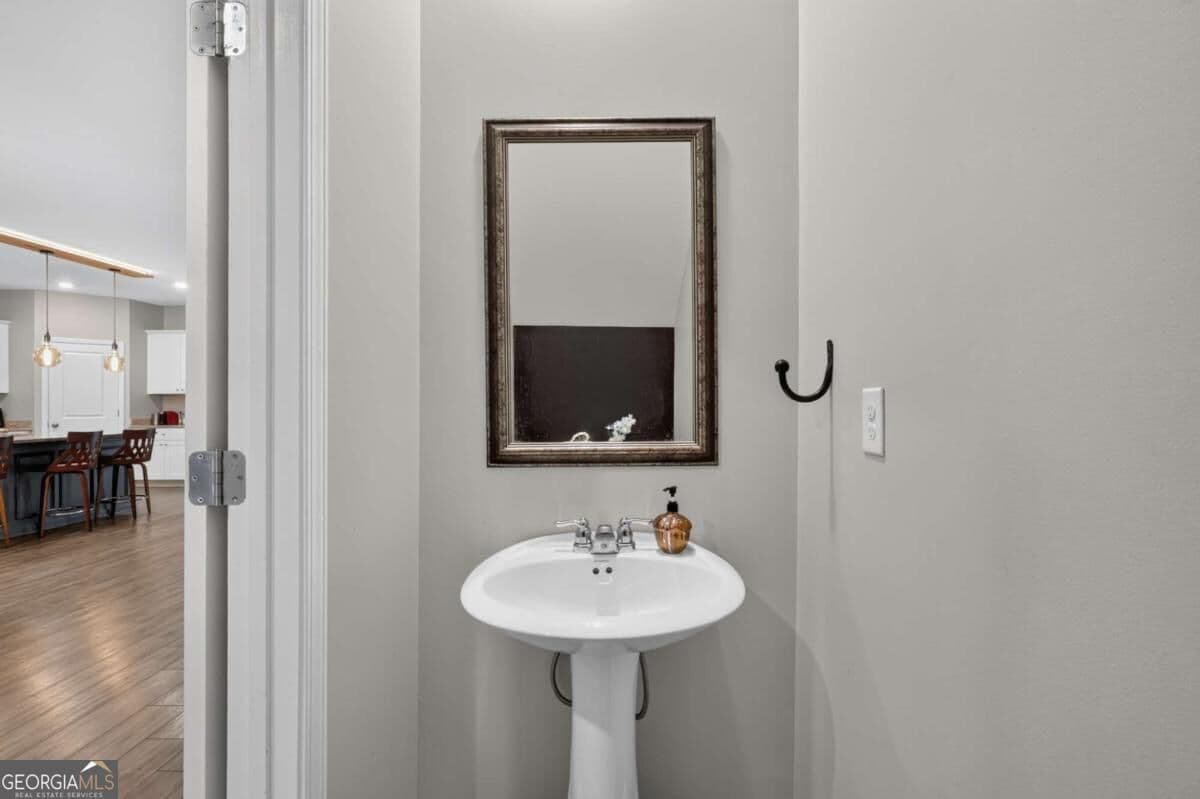 5 bedroom, 2.5 bathroom, 2,275 sq ft single family residence for sale at 4617 Waxwing Street, Hoschton, GA 30548 — photo 7