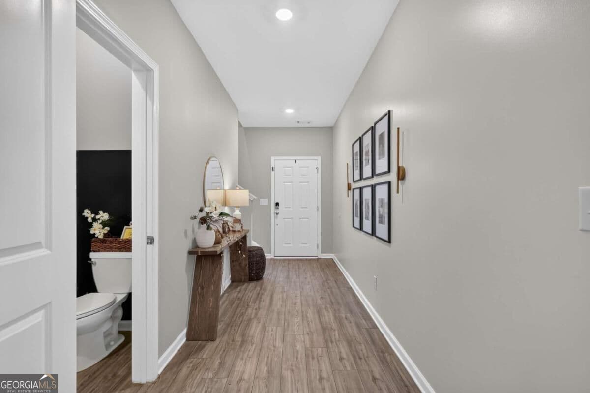 5 bedroom, 2.5 bathroom, 2,275 sq ft single family residence for sale at 4617 Waxwing Street, Hoschton, GA 30548 — photo 5
