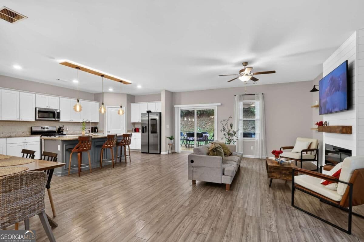 5 bedroom, 2.5 bathroom, 2,275 sq ft single family residence for sale at 4617 Waxwing Street, Hoschton, GA 30548 — photo 8