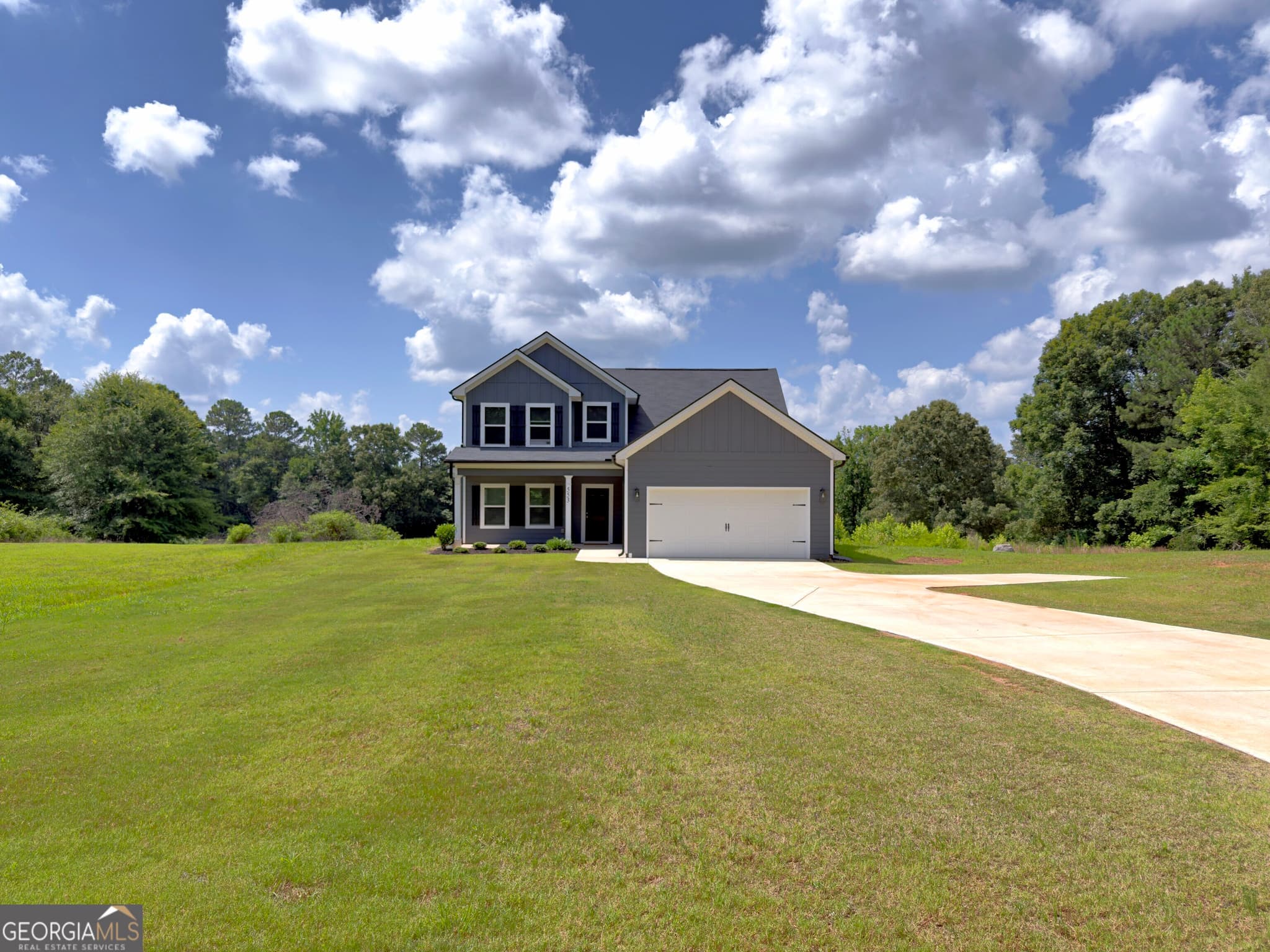 4 bedroom, 2.5 bathroom, 2,360 sq ft single family residence for sale at 553 Old Union Gin Road, Forsyth, GA 31029 — photo 1 of 33