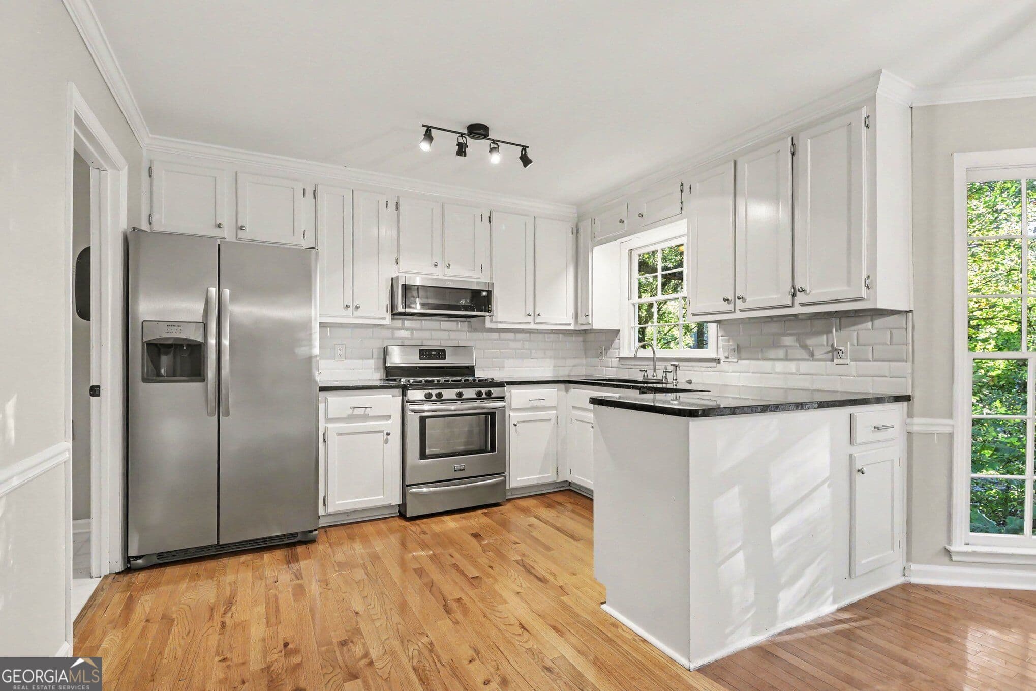 3 bedroom, 2.5 bathroom, 1,882 sq ft single family residence for sale at 3514 Nettle Lane, Roswell, GA 30075 — photo 2