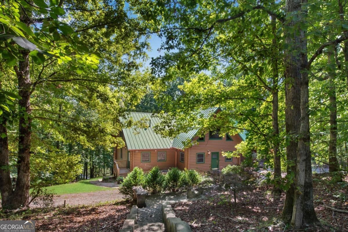 5 bedroom, 5.5 bathroom, 4,510 sq ft cabin,single family residence for sale at 1300 Soap Creek Road, Ball Ground, GA 30107 — photo 3