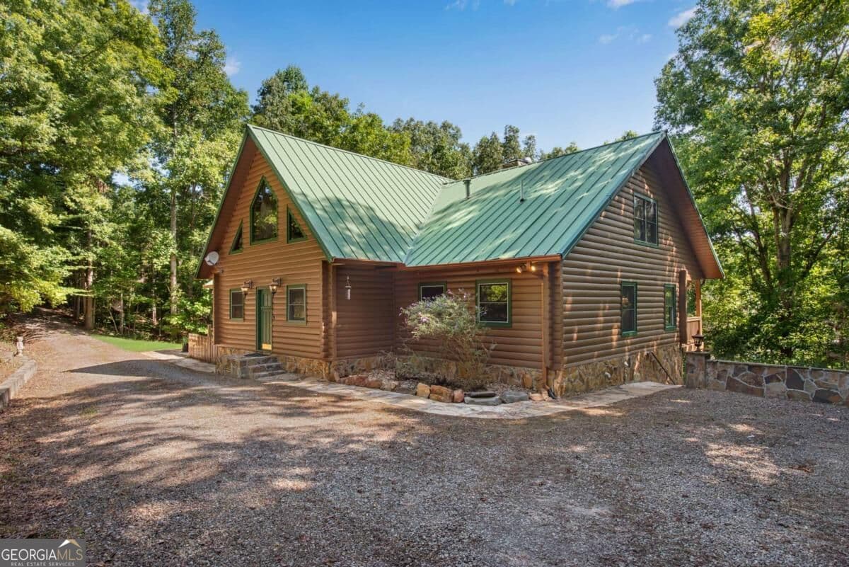 5 bedroom, 5.5 bathroom, 4,510 sq ft cabin,single family residence for sale at 1300 Soap Creek Road, Ball Ground, GA 30107