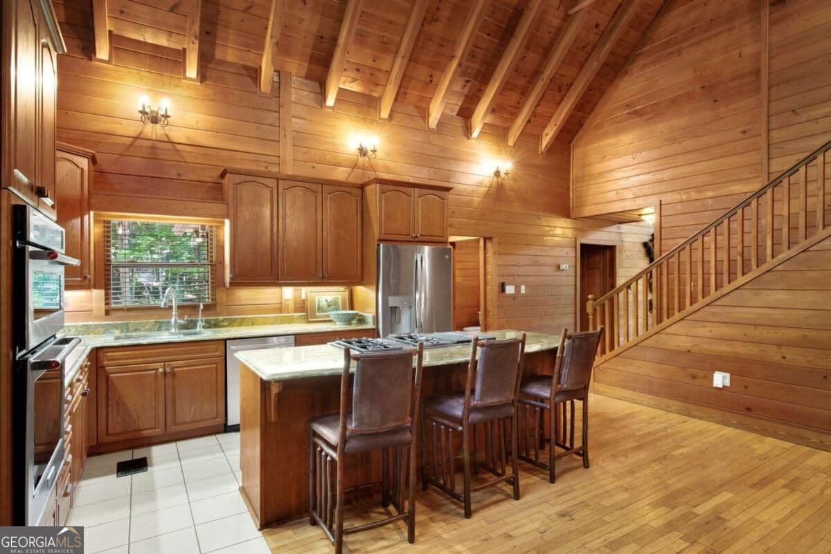 5 bedroom, 5.5 bathroom, 4,510 sq ft cabin,single family residence for sale at 1300 Soap Creek Road, Ball Ground, GA 30107 — photo 9