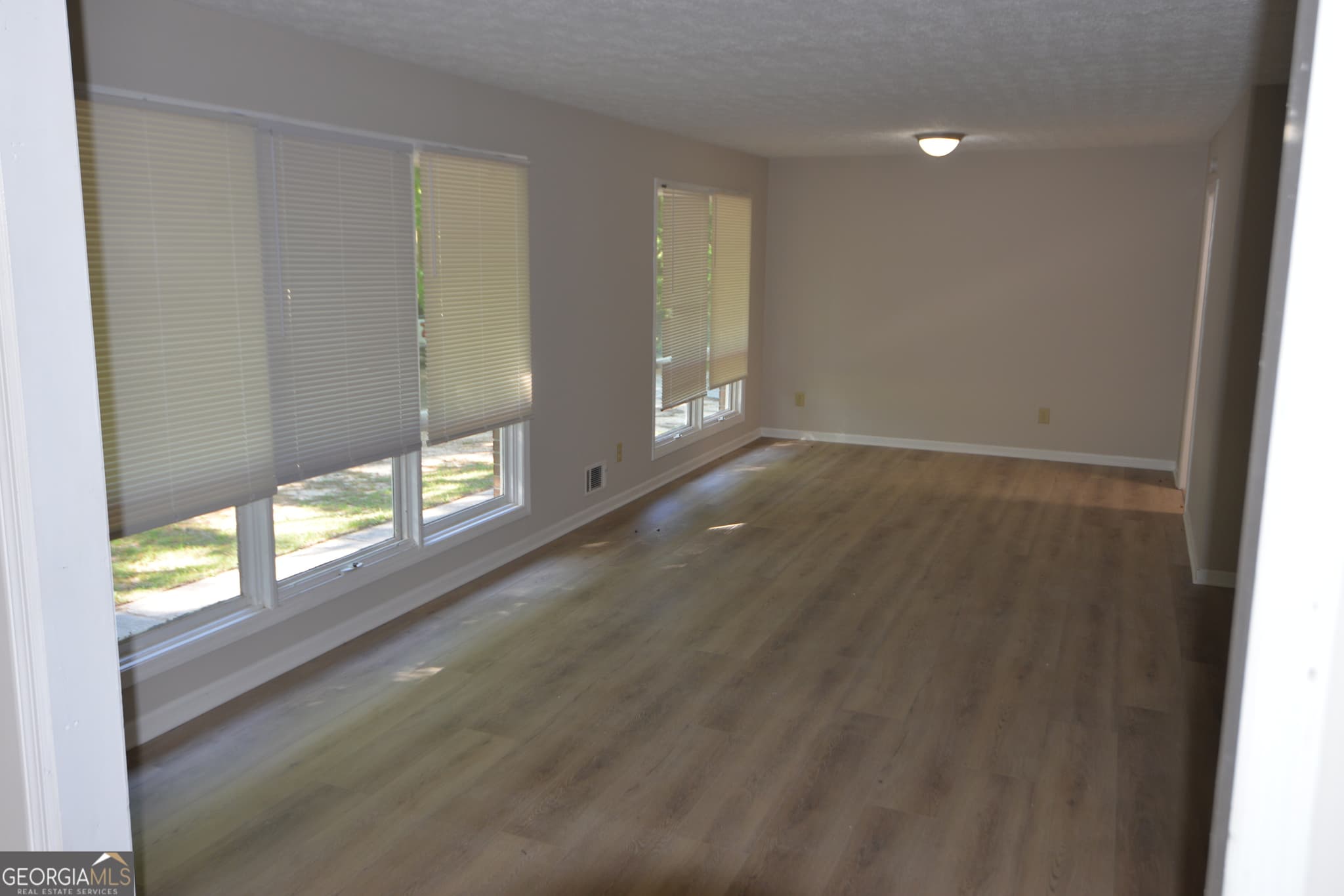 3 bedroom, 2.5 bathroom, 2,020 sq ft single family residence for sale at 3478 Highway 81, Hampton, GA 30228 — photo 3