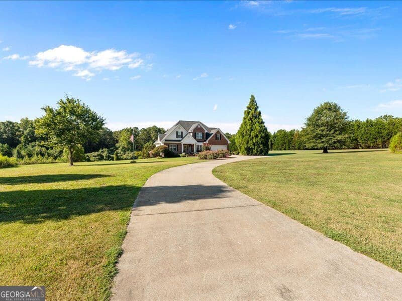5 bedroom, 2.5 bathroom, 2,148 sq ft single family residence for sale at 1285 Highway 5, Carrollton, GA 30116 — photo 2