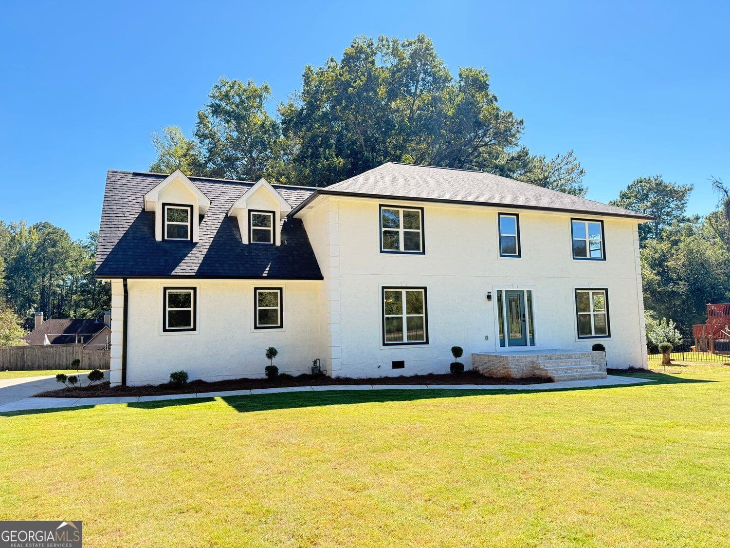 4 bedroom, 2.5 bathroom, 3,140 sq ft single family residence for sale at 2887 Lake Jodeco Road, Jonesboro, GA 30236 — photo 2