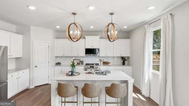 5 bedroom, 4 bathroom, 2,774 sq ft single family residence for sale at 8043 Dickens Drive, Fairburn, GA 30213 — photo 6