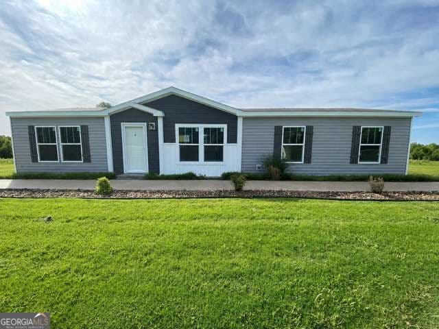 3 bedroom, 2 bathroom manufactured home,single family residence for sale at 326 Thomas Street, Eatonton, GA 31024 — photo 2
