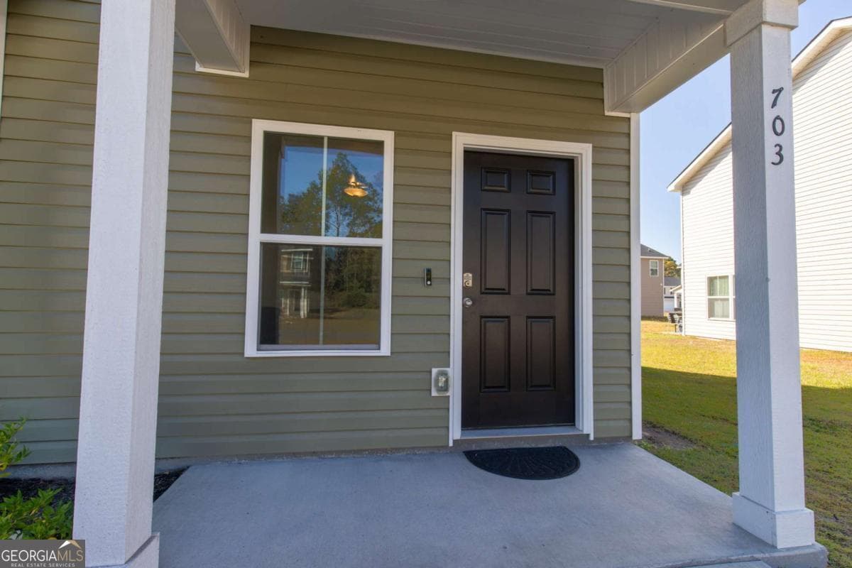 4 bedroom, 2.5 bathroom, 1,801 sq ft single family residence for sale at 703 Mill Creek, Hinesville, GA 31313 — photo 4