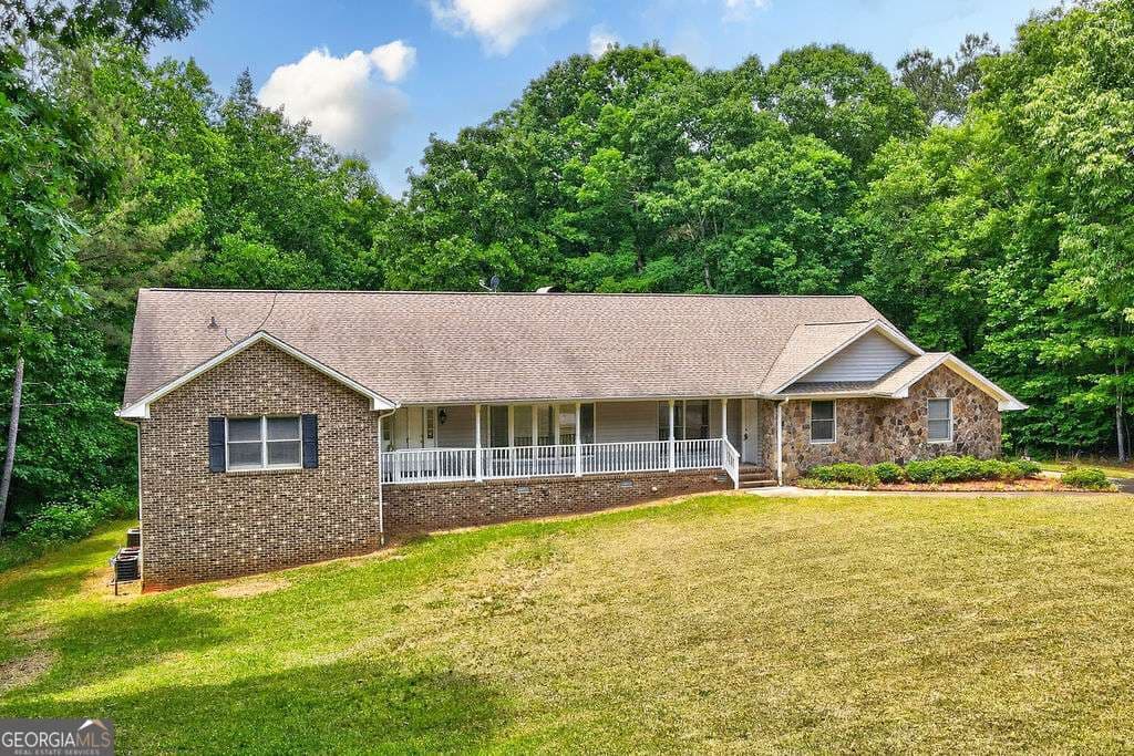 5 bedroom, 3.5 bathroom, 5,770 sq ft single family residence sold at 2260 Belmont Road, Arnoldsville, GA 30619