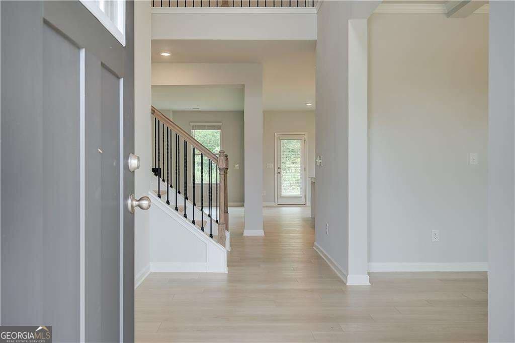5 bedroom, 4.5 bathroom, 3,699 sq ft single family residence for sale at 709 Dunlake Way, Locust Grove, GA 30248 — photo 2
