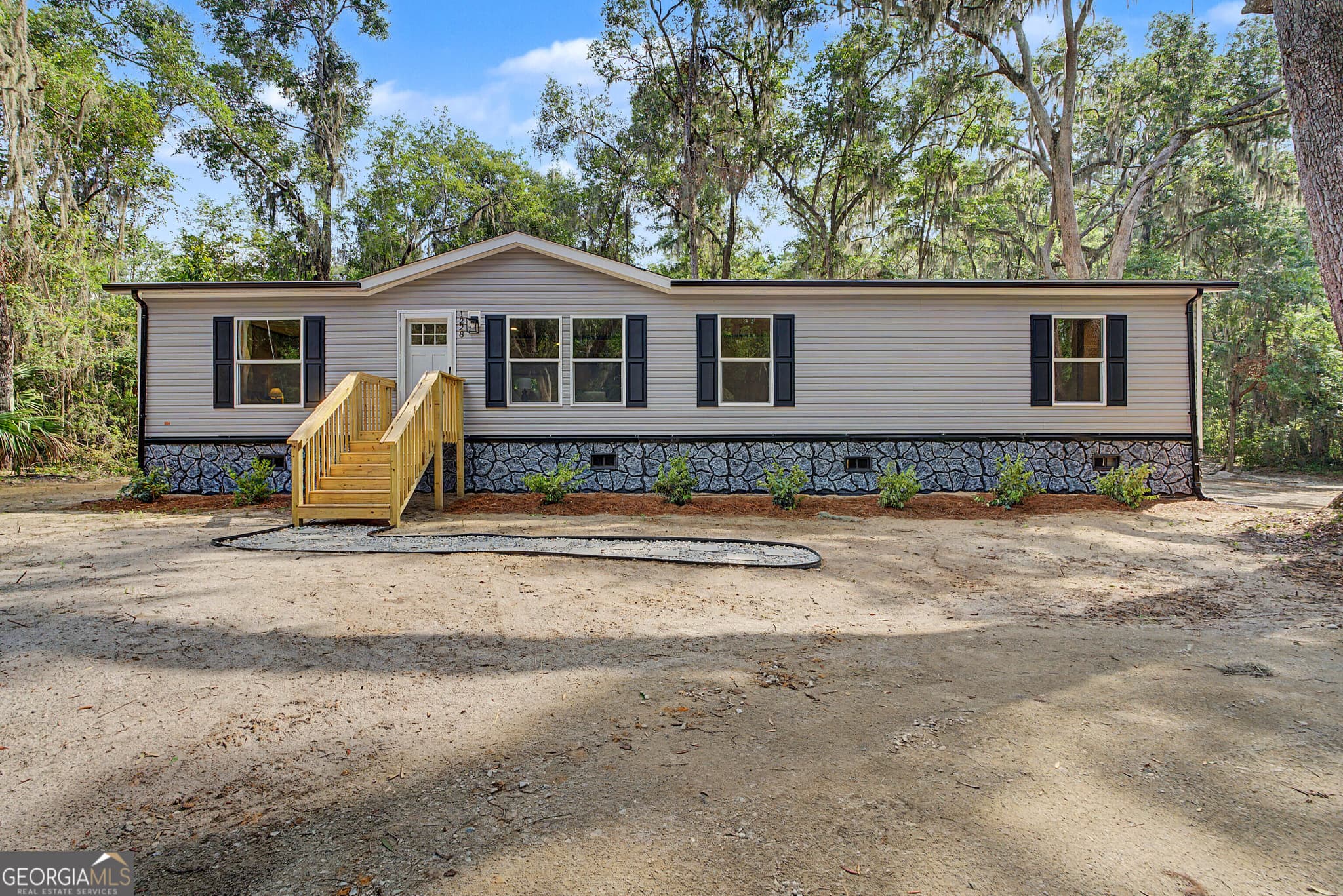4 bedroom, 2 bathroom, 1,680 sq ft manufactured home,single family residence for sale at 1228 Hatcher Drive, Townsend, GA 31331 — photo 2