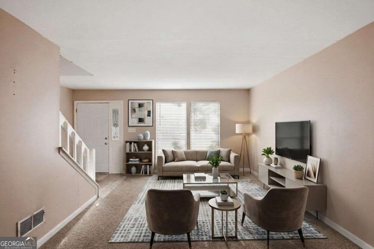 4 bedroom, 2.5 bathroom, 2,045 sq ft single family residence for sale at 1001 Chapman Lane, Stone Mountain, GA 30088 — photo 2