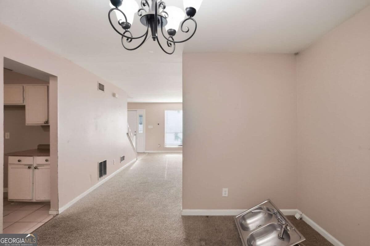 4 bedroom, 2.5 bathroom, 2,045 sq ft single family residence for sale at 1001 Chapman Lane, Stone Mountain, GA 30088 — photo 10