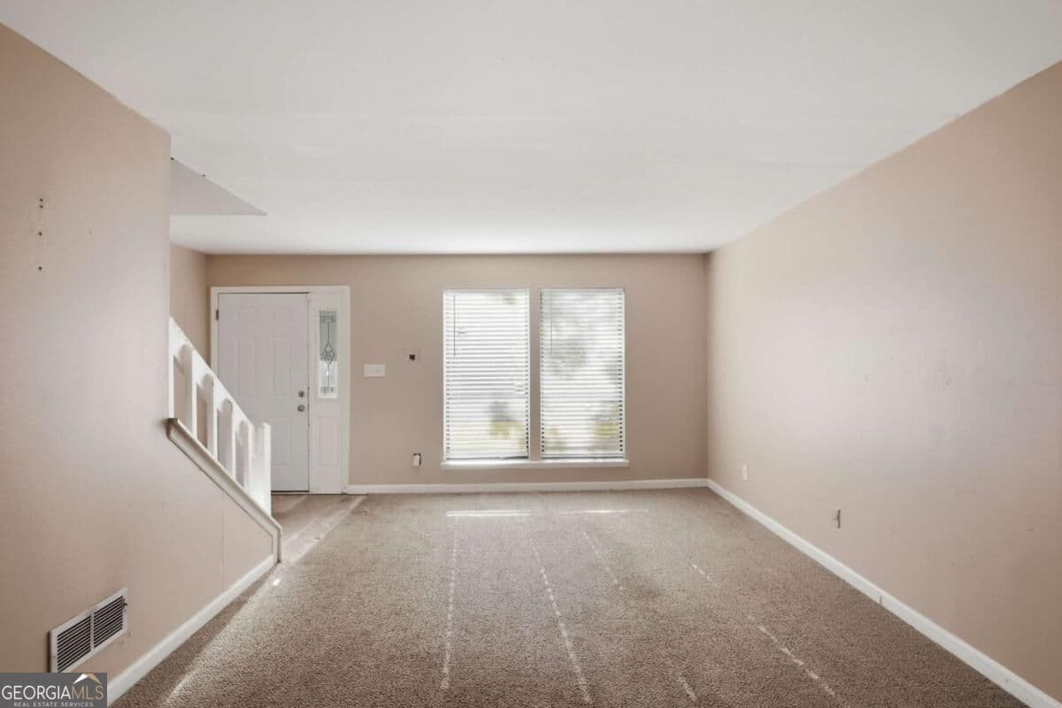 4 bedroom, 2.5 bathroom, 2,045 sq ft single family residence for sale at 1001 Chapman Lane, Stone Mountain, GA 30088 — photo 8